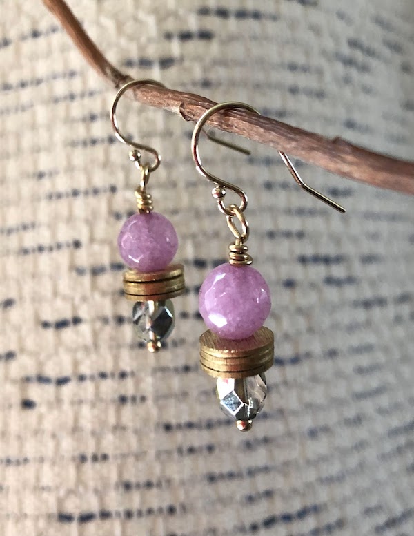 Lavender colored, semi precious gem stones wire wrapped with a Czech glass bead. All hardware is gold.